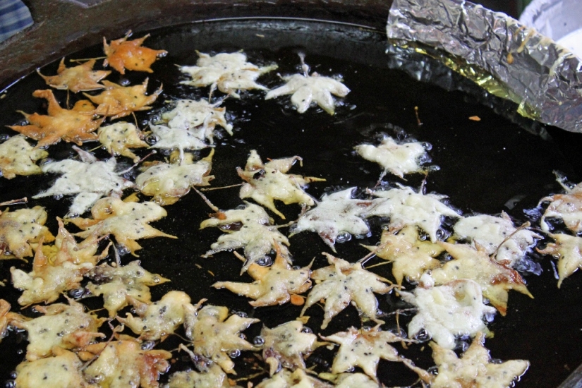 Leaves of maple in a deep fryer