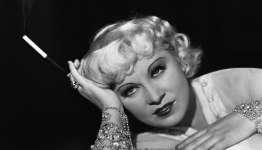 Mae West is a scandalous actress who became America's first sex symbol