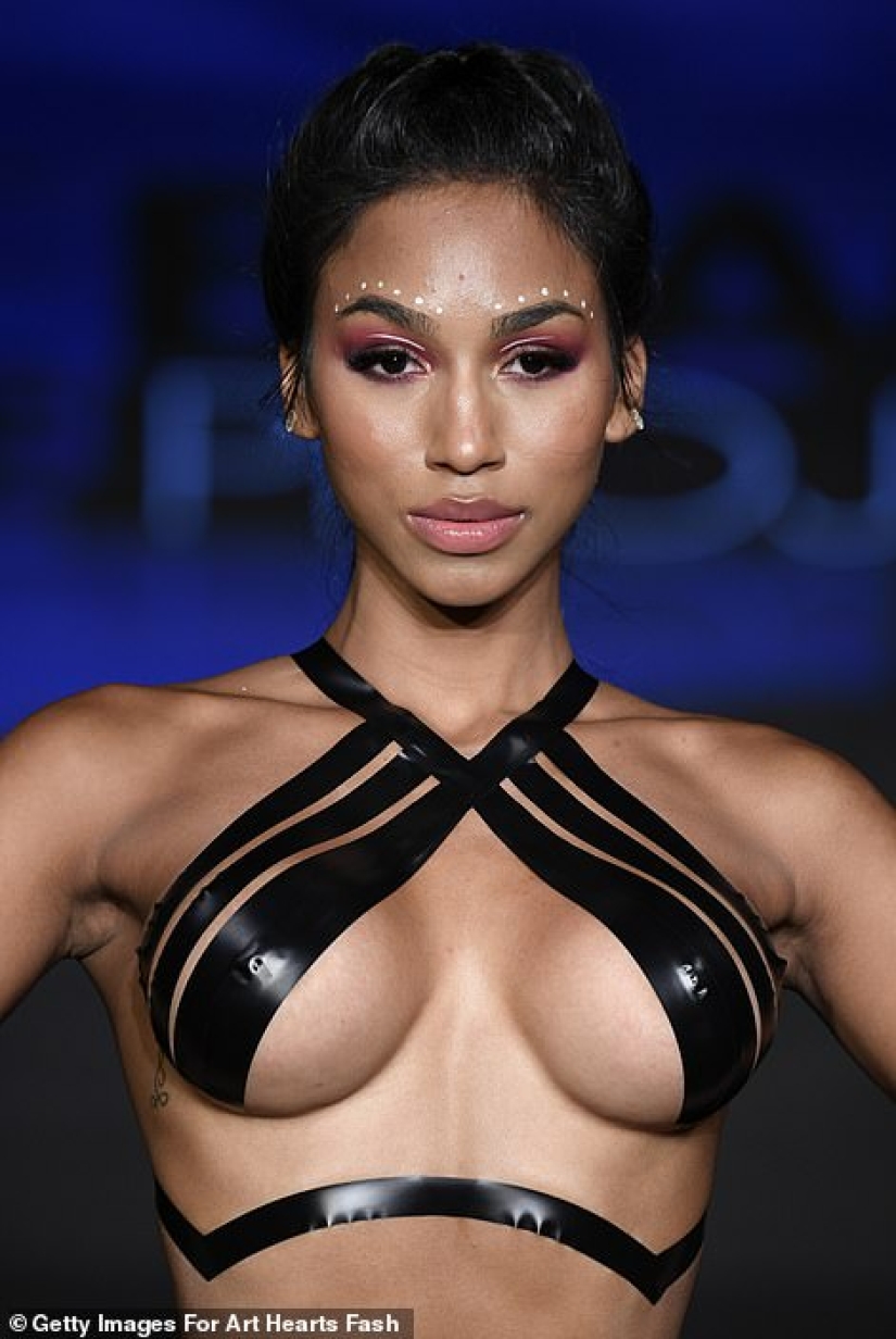 Miami Swim Week runway models pose in a ribbon bikini