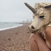 Naked girls in masks by Ben Hopper