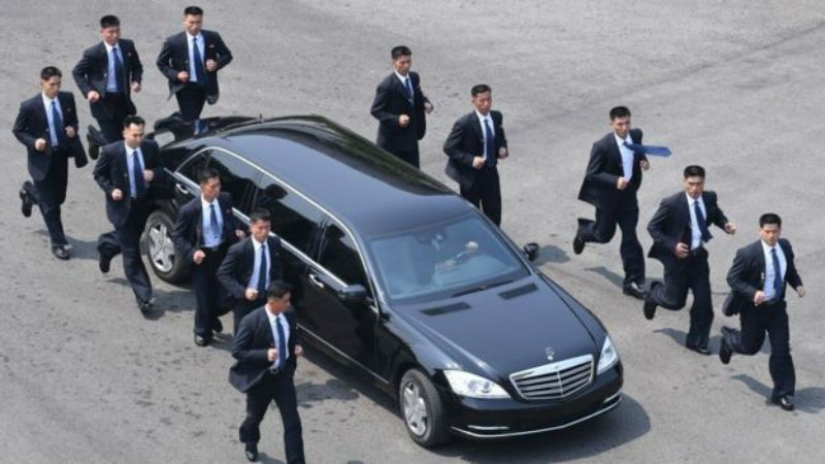 People in suits: who are Kim Jong-un's running bodyguards