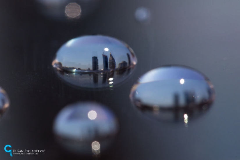 Photographer of 15 years shoots cities of the world in drops of water