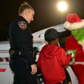 Police officers "detained" the Grinch thief of Christmas after a 5-year-old boy called 911