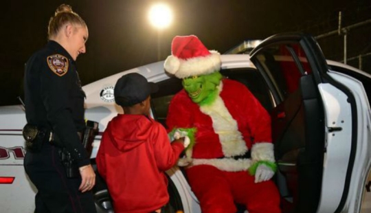 Police officers "detained" the Grinch thief of Christmas after a 5-year-old boy called 911