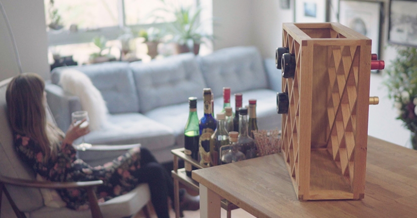 The illusionist created a wine rack in which bottles disappear