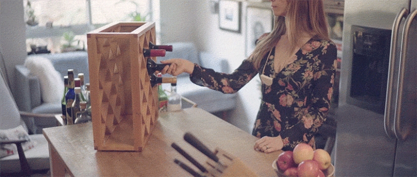 The illusionist created a wine rack in which bottles disappear