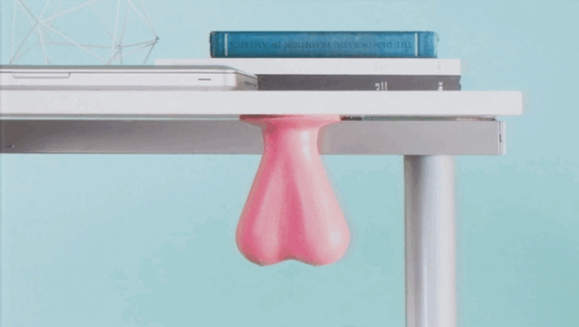 The invention in the form of rubber testicles will help relieve stress at work