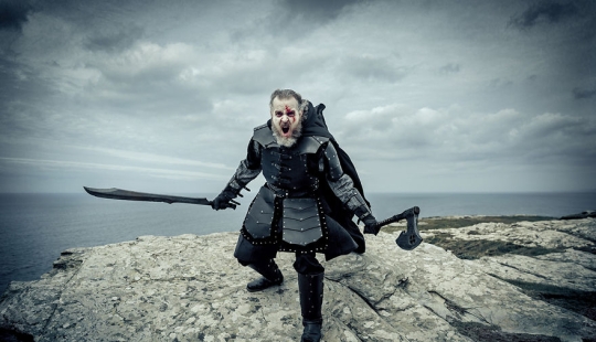 The man has a midlife crisis, and he arranged a photo shoot in the style of "Game of Thrones"