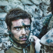 They look, but they don't see: the faces of soldiers who have gone through hell