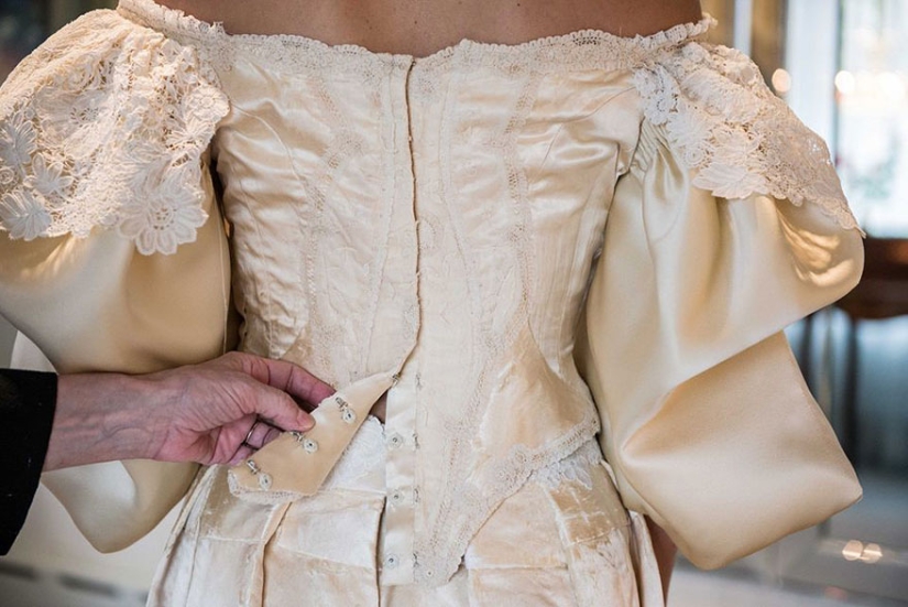 This bride is the 11th in her family to wear this 120—year-old wedding dress