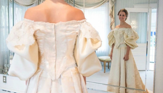 This bride is the 11th in her family to wear this 120—year-old wedding dress