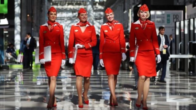 What does the uniform of flight attendants look like in different airlines