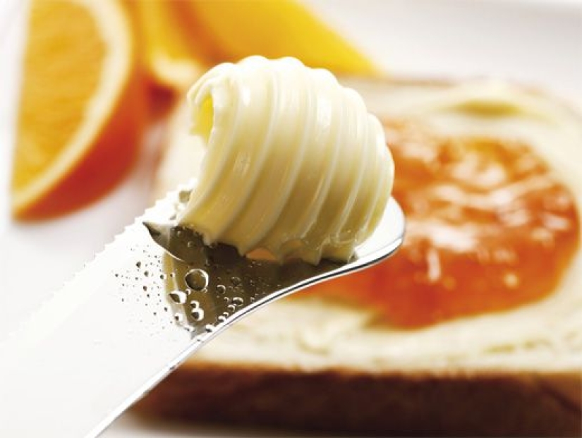 What is a spread and how does it differ from butter and margarine