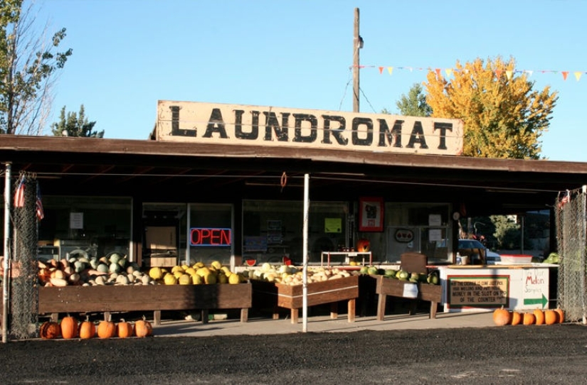 Why do Americans do laundry in laundries and not at home?