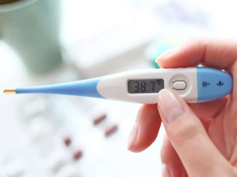 Why do some people put a thermometer under their arm, others in their mouths, and some...