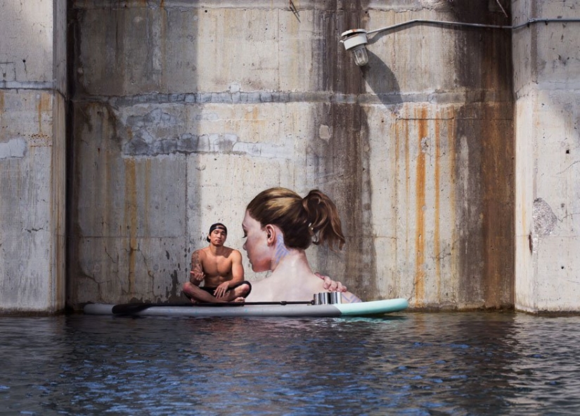 Women coming out of the water — the creation of an artist balancing on a surfboard