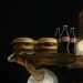 "Your burger, Madonna": heroes of Renaissance canvases devour mountains of fast food