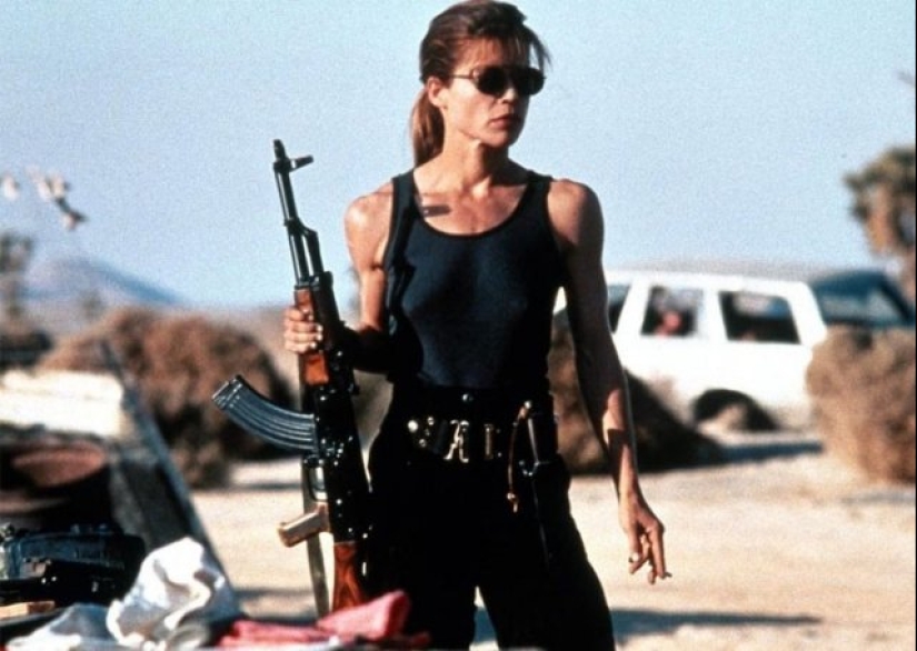20 famous girls with guns in their hands