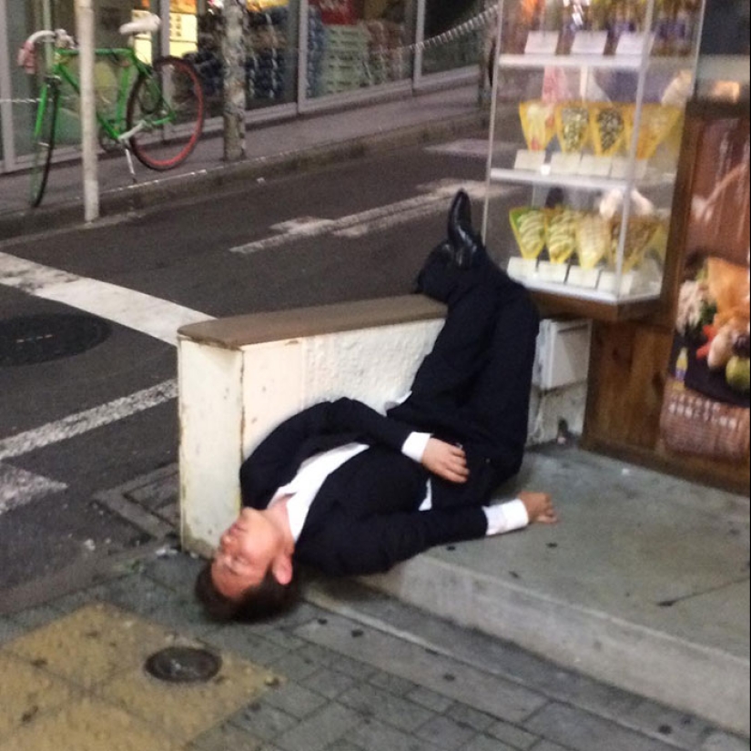 22 photos of people asleep in the most unexpected places