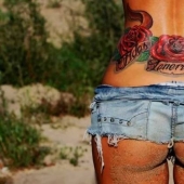 22 tatuajes de muñones de vagabundo de moda en la espalda baja