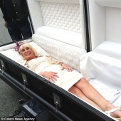 58-year-old bride arrives at her own wedding... in a coffin