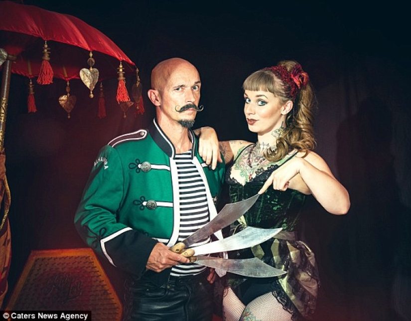 A British woman dropped out of university for a circus performance where she drives nails into her father's nose