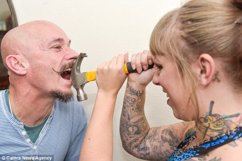 A British woman dropped out of university for a circus performance where she drives nails into her father's nose