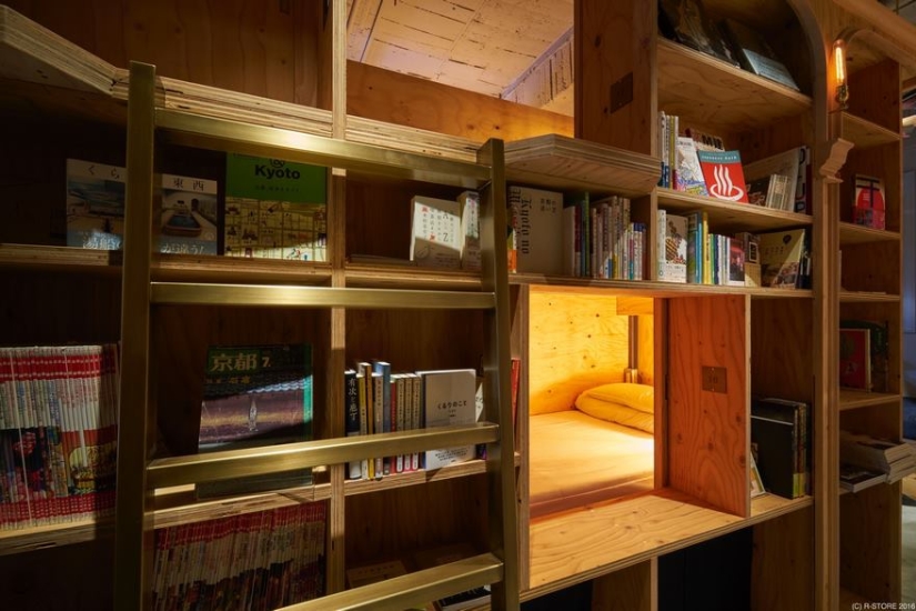 A new themed hostel in Kyoto offers to spend the night on a bookshelf