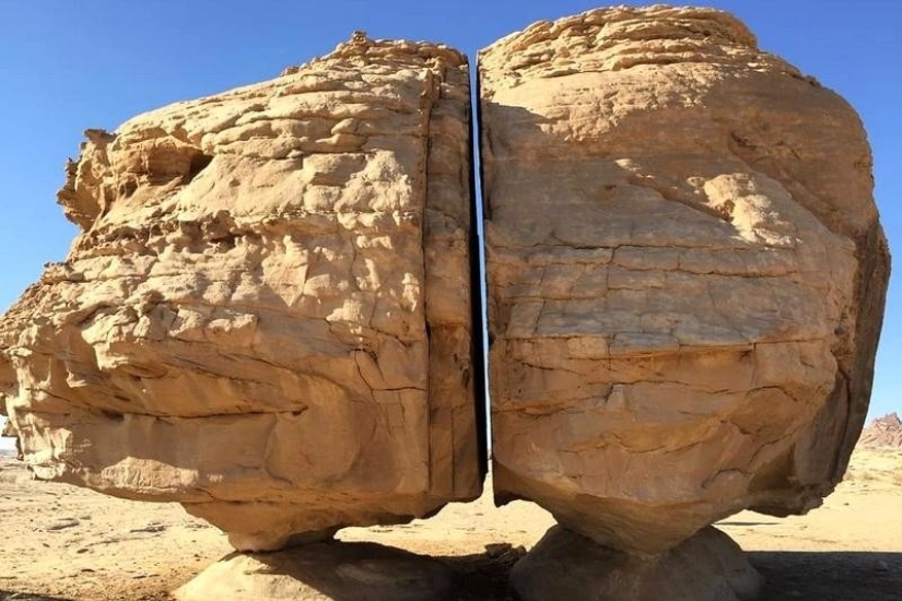 Al-Naslaa is a mystical rock with a perfect fault in the middle of the Arabian desert