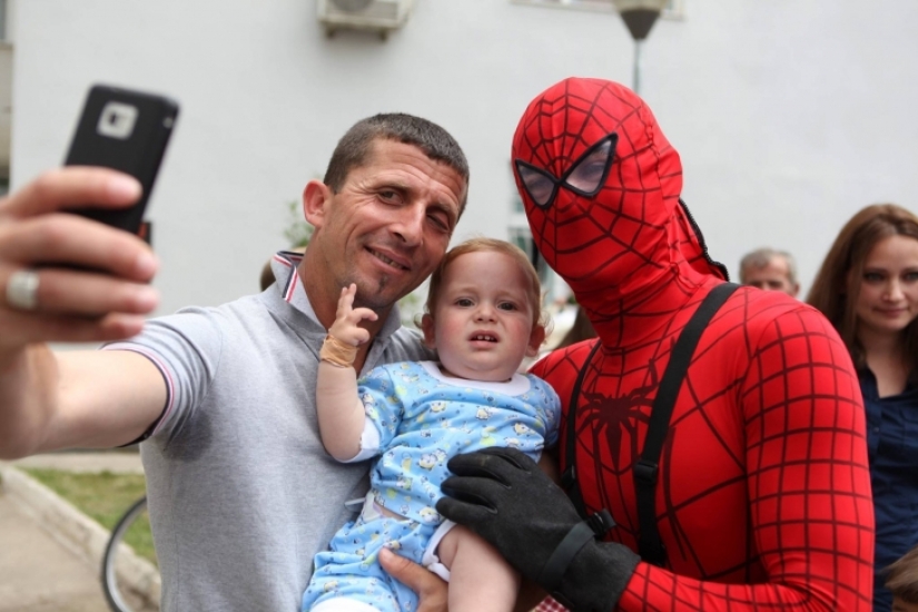 Albanian policemen dressed up as superheroes to congratulate sick children on the holiday