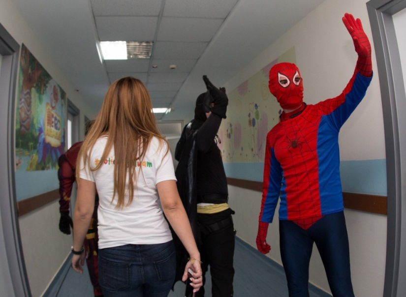 Albanian policemen dressed up as superheroes to congratulate sick children on the holiday