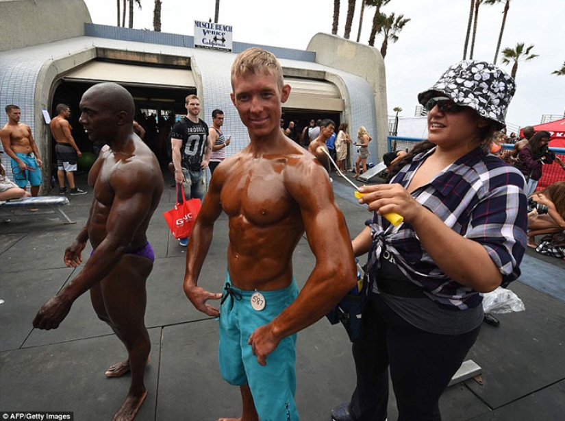 American bodybuilders dressed up in swimsuits in honor of Memorial Day
