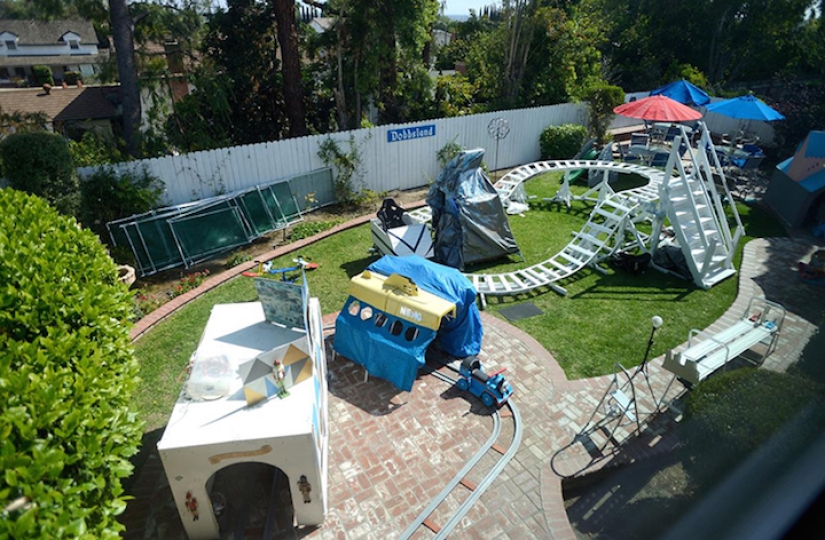 An engineer grandfather built an amusement park in the backyard for his grandchildren