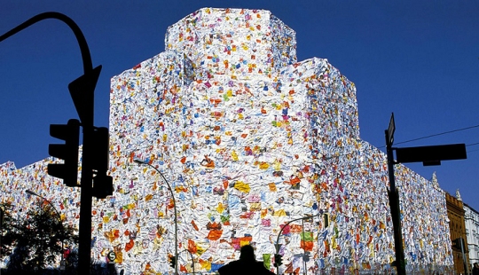 Artist Ha Schult wrapped the former Berlin post office with thousands of love letters Artist Ha Schult wrapped the former Berlin post office with thousands of love letters