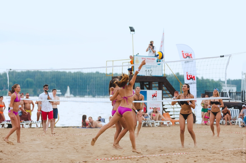 Beach volleyball tournament among models