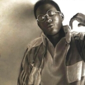 Charcoal portraits of hyperrealist Major Olajide