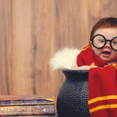 Charming photo shoot of a baby in the image of Harry Potter