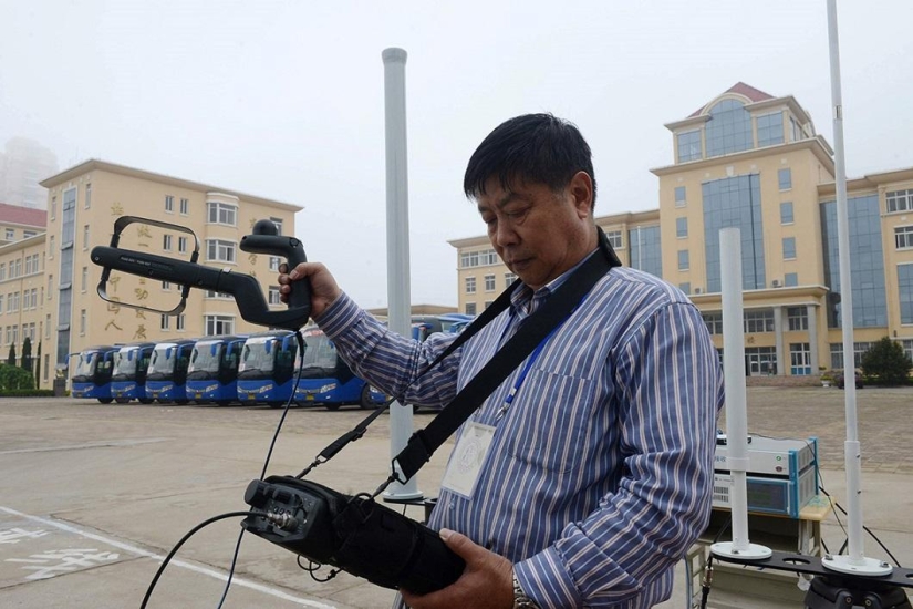 Chinese police showed devices that applicants tried to use to pass exams