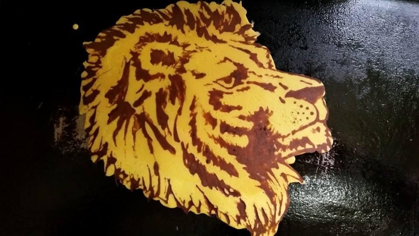 Creative dad bakes fantastic colorful pancakes for his child