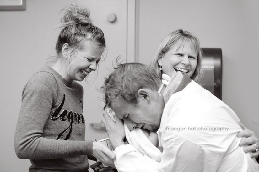 Dads see their newborn babies for the first time