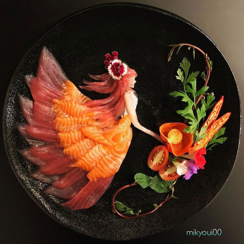 El arte culinario de placas: el chef Japonés se convierte corte el pescado en verdaderas obras maestras