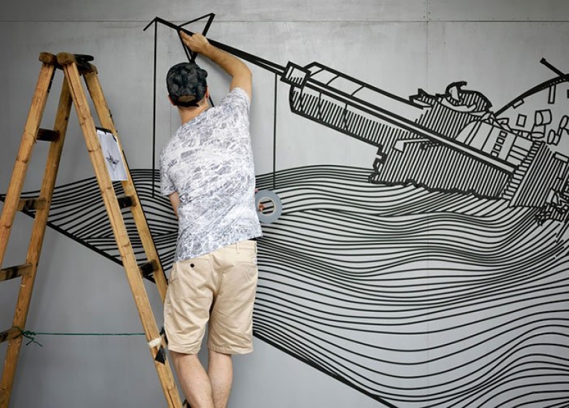 Electrical tape instead of paint. Beautiful street art from improvised materials