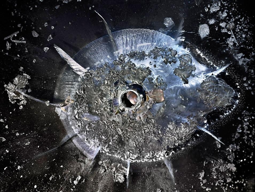 Exploding galaxies - how a bullet breaks organic glass