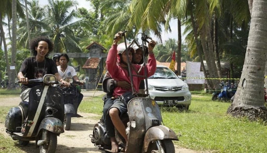 Fans of the legendary Vespa mopeds in Indonesia