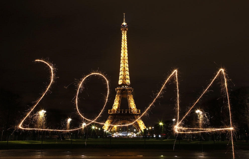 Fireworks, beaches and champagne - how the world met the new year 2014
