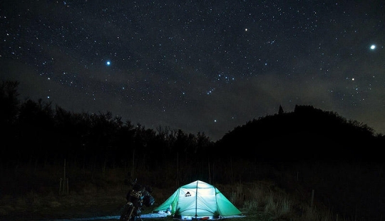 In a tent under the stars