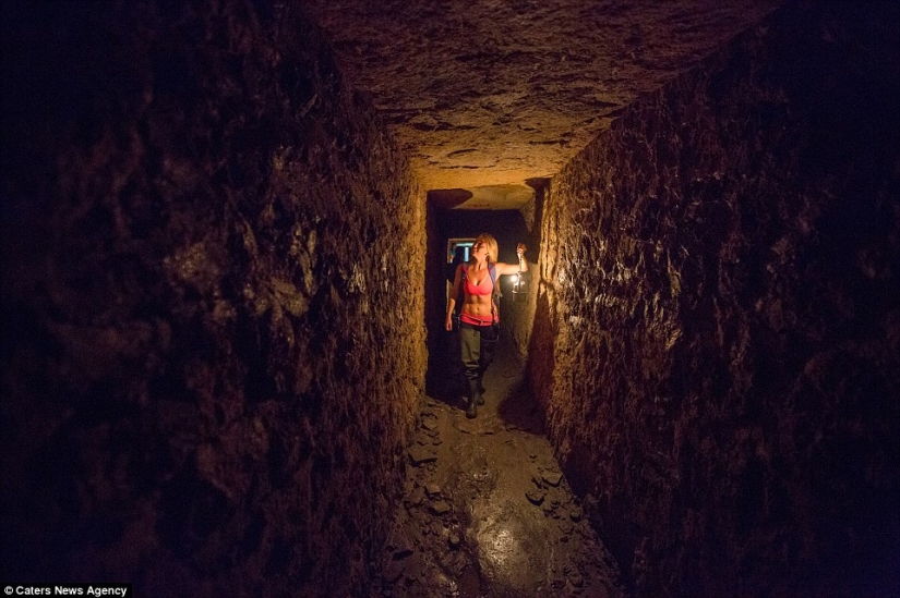 Indiana Jane: An American woman on a surfboard explores the skeletal catacombs of Paris