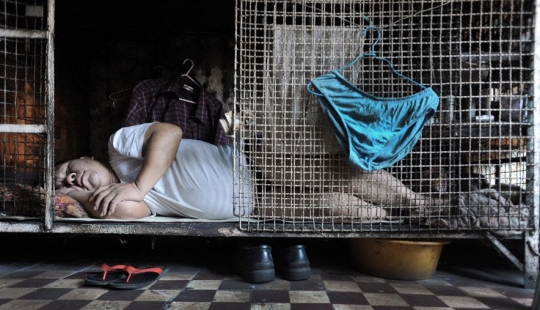 Life in "dog cages" in Hong Kong