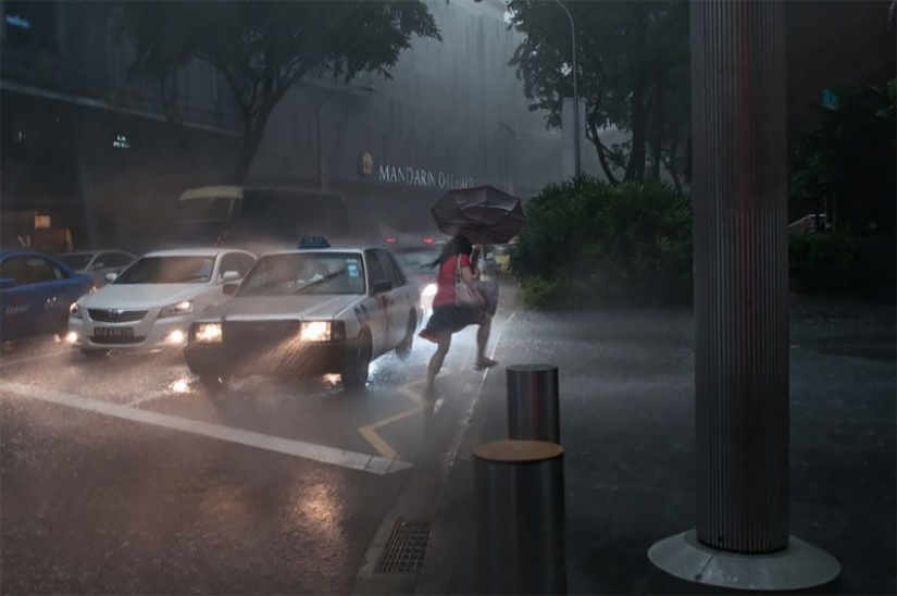 Lluvioso estado de ánimo: un fotógrafo de Singapur capturas de las emociones de las personas durante un aguacero