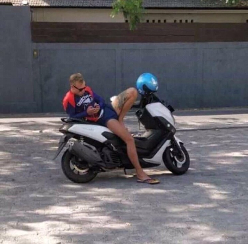 Look again — there is no girl on a motorcycle, no!